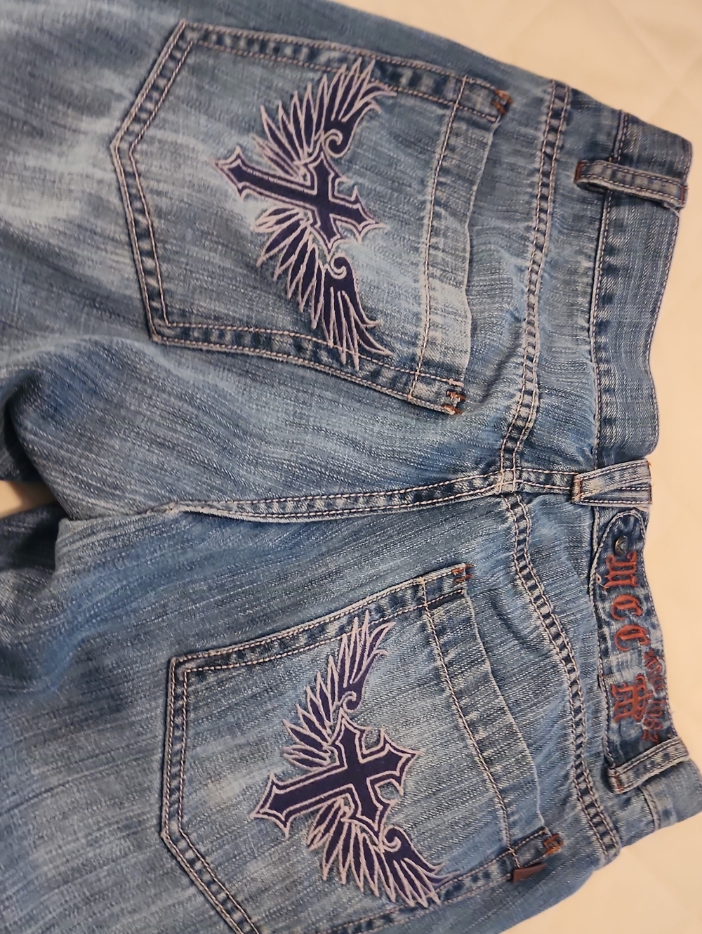 CHANEL Blue Denim Jeans with Red Embroidered Logo